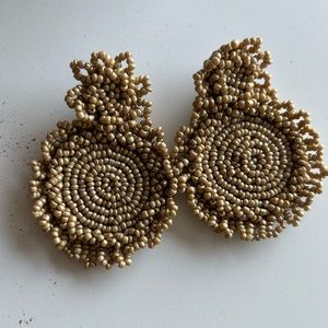 Fashion statement earrings. About 3in long, felt back.